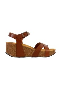 Sandalo wedge in pelle marrone con suola in sughero, dotato di tre cinturini incrociati e di una cinturino alla caviglia regolabile con fibbia argentata.