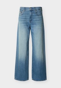 Μπλε τζιν παντελόνι με φαρδιά μπάρα και ξεθωριασμένο ανοιχτό πλύσιμο στο εμπρόσθιο μέρος των μηρών, εμπρόσθιες τσέπες, θηλιές για ζώνη και κλείσιμο με κουμπί.