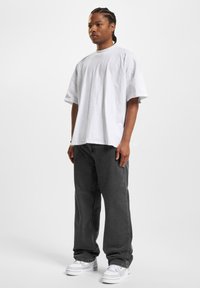DEF DRY BAGGYS - Relaxed fit jeans - grey washed