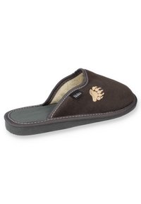 Braune Wildleder-Hausschuhe ohne Verschluss mit einer cremefarbenen Innenausstattung, schwarzem Boden und einem tanbären Fußabdruck-Design. Verfügbar mit kontrastierenden Nähten am Rand.