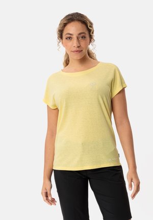 Kurzärmliges gelbes T-Shirt aus weichem Stoff, mit rundem Ausschnitt, lockerer Passform und kleinem Herzdesign auf der Brust.