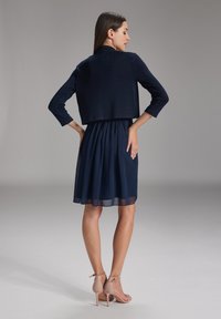 Swing Neuletakki - navy