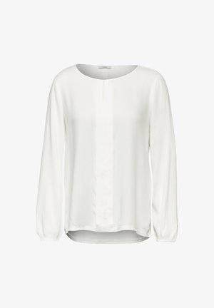 Bílá halenka s dlouhým rukávem a kulatým výstřihem, texturovaná látka, středový skládací detail a elastické manžety. Nabízí uvolněný střih a zakřivený lem.