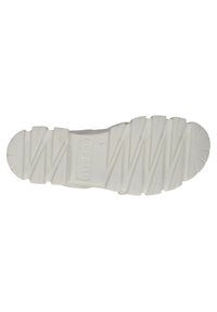 White rubber shoe sole with deep tread pattern and brand logo. Features rounded edges and segmented design for improved grip.