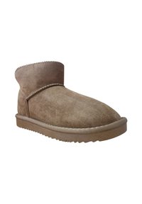 Stivaletti in suede marrone con punta tonda, dettagli di cucitura discreti, una texture morbida e una suola in gomma spessa con un motivo di battistrada.