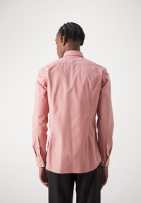 HUGO JENNO - Majica - light/pastel red