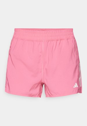 Roosa sportlikud šortsid elastse vöökohtaga, millel on valge Adidas logo ja kolm vertikaalset triipu külgedel. Sile kangastekstuur.