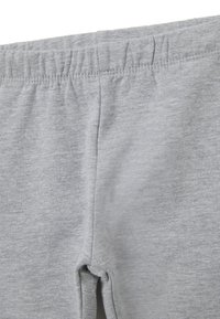 Grijze, zachte katoenen leggings met een elastische taille, een gladde textuur en een subtiele gemêleerde patroondesign. Kenmerkt een strakke pasvorm en geen zichtbare hardware.