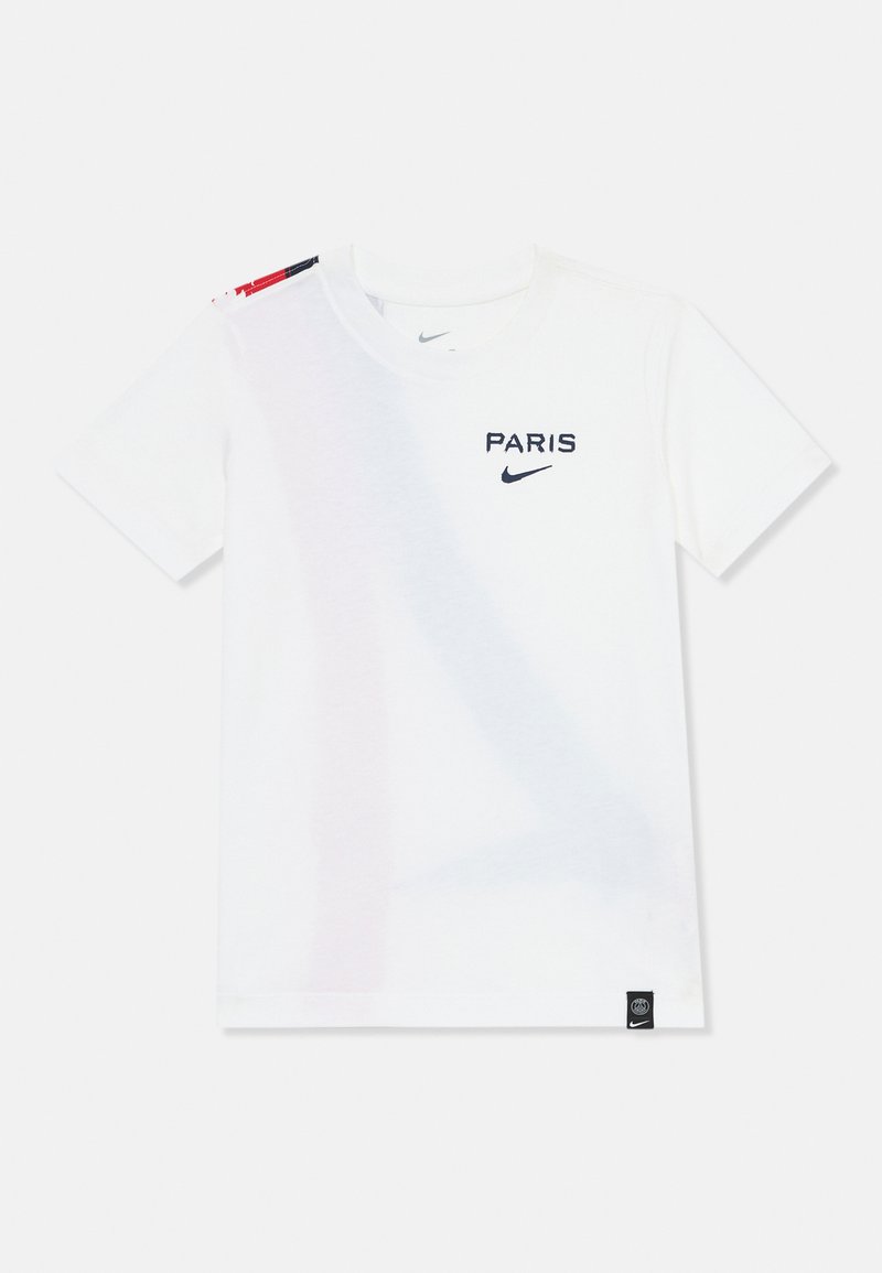 White cotton t-shirt with "PARIS" and Nike logo in navy. Features multicolored accents on the shoulder and a black label on the hem.