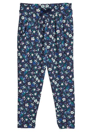 Pantalones azul marino con estampado floral blanco y azul, cintura elástica, cordón ajustable y bolsillos laterales.