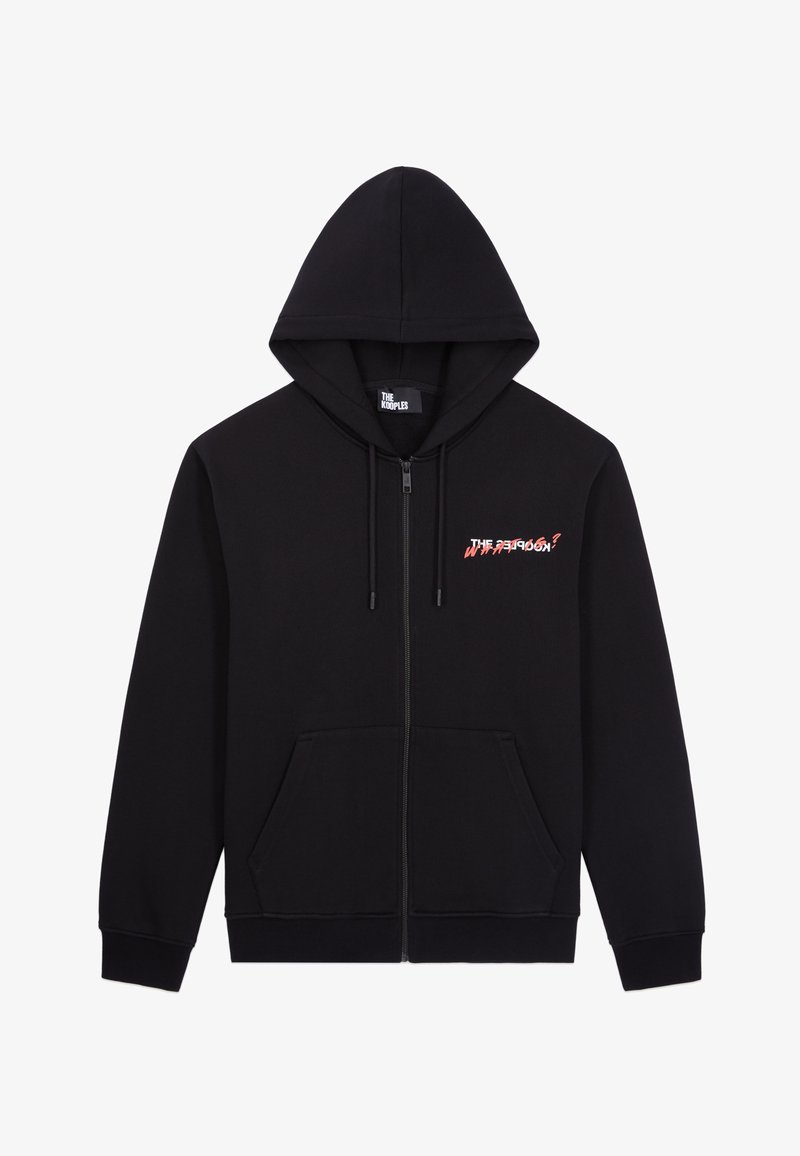 Haut de survêtement noir avec fermeture éclair, poches avant et un petit motif rouge et blanc sur la poitrine gauche avec écrit "THE KOOPLES".
