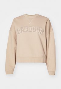 Light beige cropped sweatshirt with "BARBOUR" embroidered in silver. Features a round neckline and loose, long sleeves. Soft texture.