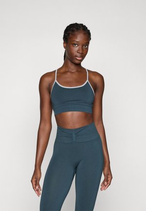 Yogasearcher DHARMA SEAMLESS BRA - Sportski grudnjak s blagom potporom - forest