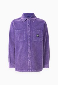Purple corduroy shirt with a collar, two front pockets, and a small logo patch. Features button-down front and long sleeves.