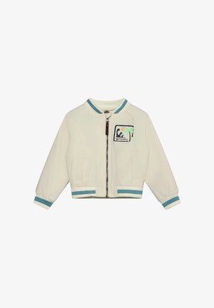 Veste bomber blanche à fermeture éclair avec poignets et ourlet côtelés, présentant une broderie colorée de palmier sur la poche poitrine. Tissu texturé.