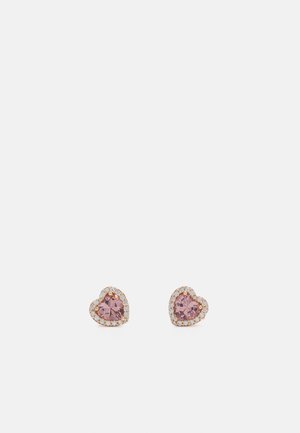 Heart-shaped earrings featuring pink gemstones surrounded by a circular halo of small, clear crystals set in a gold-tone metal.