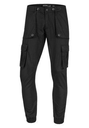 Sorte cargo bukser med flere sidelommer, elastiske mansjetter og snor i midjen. Laget av teksturert stoff, minimal hardware detaljer.