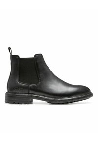 Bottines Chelsea en cuir noir avec des panneaux élastiques sur les côtés et une languette de tirage. Semelle en caoutchouc noir texturé et coutures visibles le long du bord.