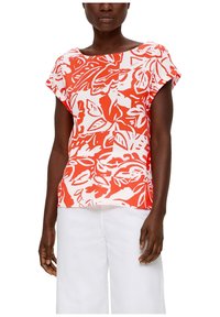Blusa a maniche corte con un motivo floreale rosso e bianco, realizzata in tessuto leggero con una vestibilità ampia e scollo rotondo.