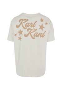 Hvid bomulds t-shirt med stor beige tekst "Karl Kani" og beige stjerner på ryggen. Rund halsudskæring, korte ærmer, afslappet pasform.