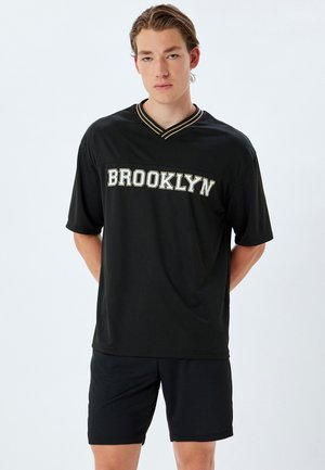 SPORT - Printtipaita - black