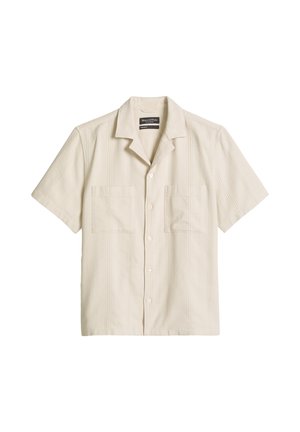 Camicia beige a maniche corte con bottoni e due tasche frontali, colletto morbido.