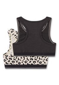 Zwei Sport-BHs: einer in reinem Schwarz, der andere in Creme mit einem schwarzen Leopardenmuster. Beide haben ein Racerback-Design und ein kontrastierendes elastisches Band.