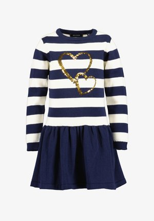 Robe rayée bleu marine et blanche à manches longues avec un double cœur doré en sequins sur la poitrine et une jupe évasée bleu marine uni.
