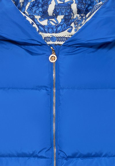 Blue puffer jacket with a shiny texture, featuring a gold zipper and a patterned inner lining in blue and white. Hood included.