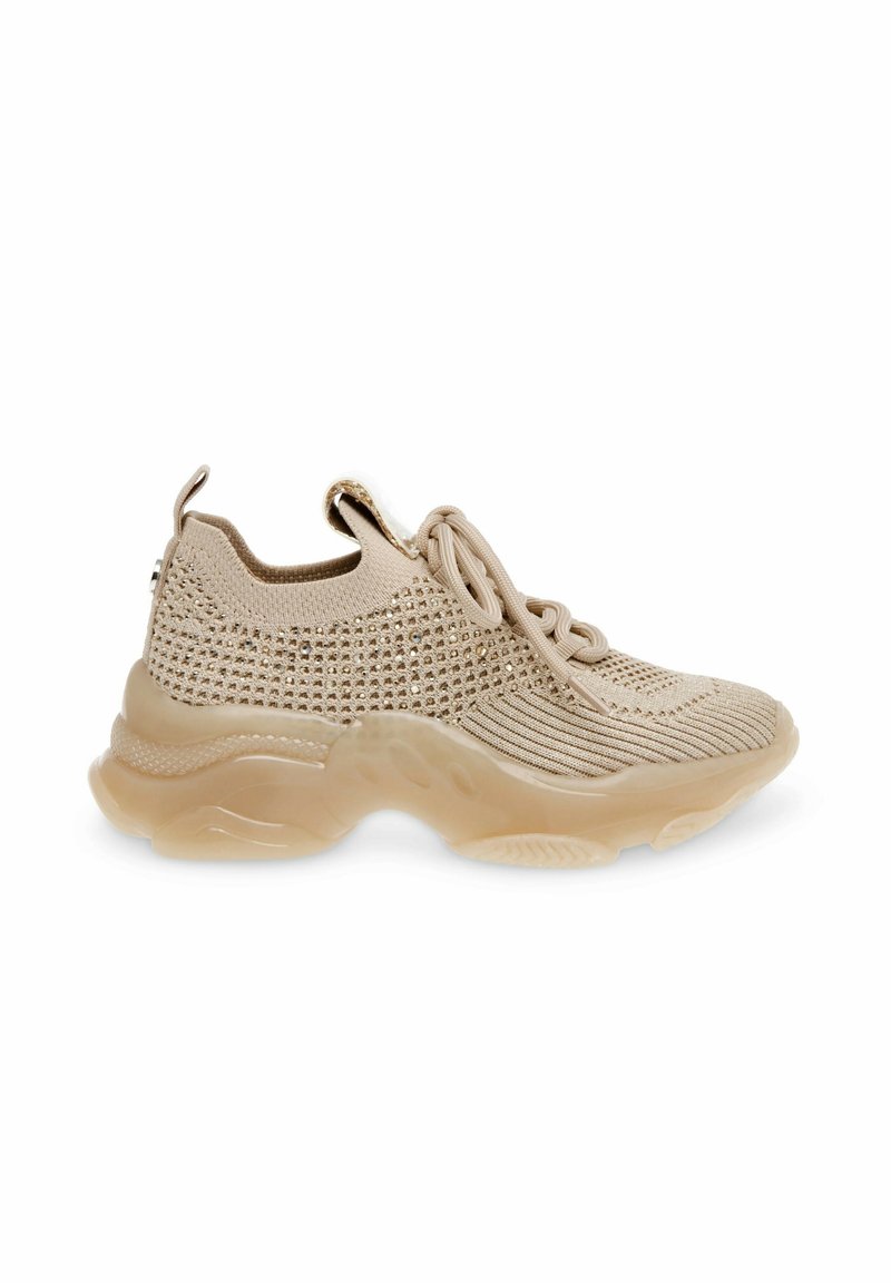 Beige Sportschuhe mit einem atmungsaktiven Strick-Obermaterial, strukturierten Mustern und einer durchsichtigen Sohle. Mit Schnürsenkeln und einem Zugtab am Absatz.