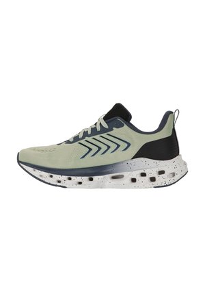Chaussure de sport vert clair et noir avec une semelle blanche coussinée tachetée et un motif flèche sur le côté, vue de l'extérieur.