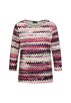 Multikleurige lange mouw top in roze, wit en zwart zigzagpatroon. Beschikt over een ronde halslijn en een zachte stoftextuur.