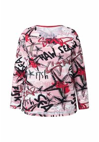 Paarse langmouwige top met een grafisch patroon van zwarte en rode sterren en tekst. Gemaakt van een lichtgewicht stof met een ronde halslijn.