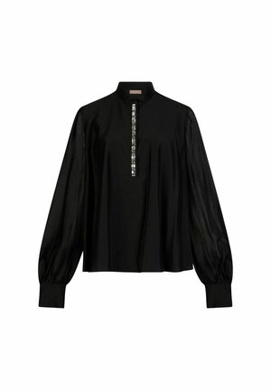 Juoda ilgomis rankovėmis palaidinė su aukštu apykakliu, voluminėmis rankovėmis, rankogaliais ir vertikaliu sidabro blizgučių raštu palei priekinę užsegimo juostelę.