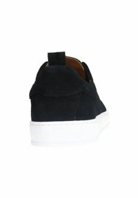 Black suede sneaker with white rubber sole. Features a padded collar and a pull tab at the back for easy wear. Smooth texture.