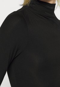Good American Long sleeved top - black