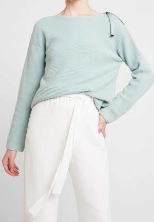 Stickad tröja - light green