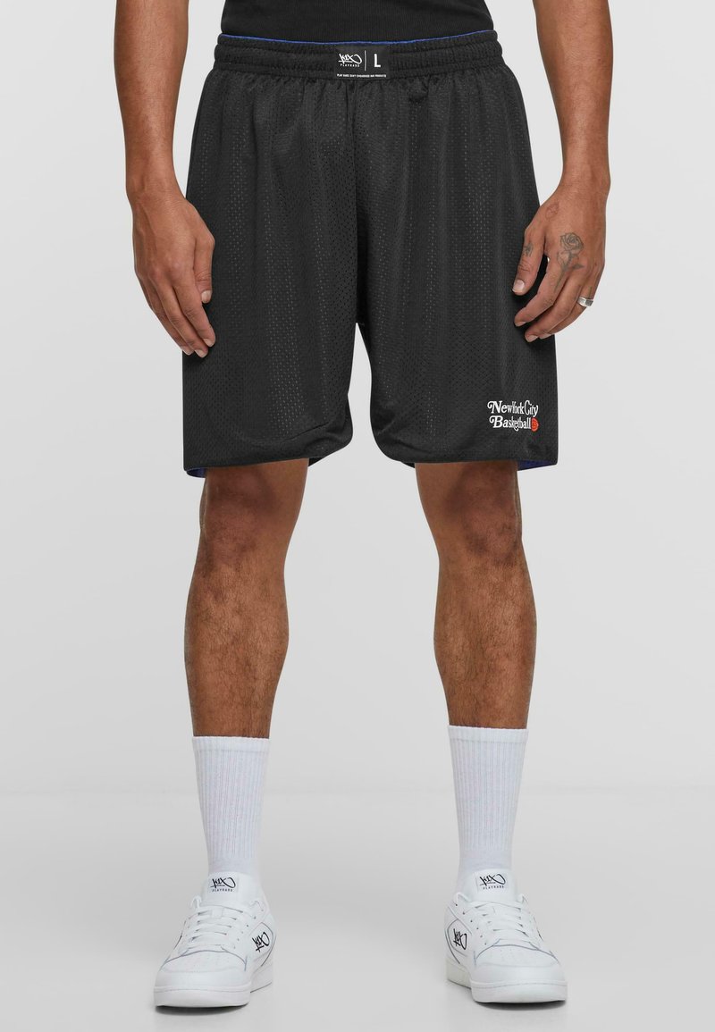 Svarte mesh basketballshorts med avslappet passform, elastisk midje og sidelommer. Har "New York City Basketball" brodert.