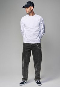 Next VINTAGE STRETCH AUTHENTIC - Laza szabású farmerek - black acid washed