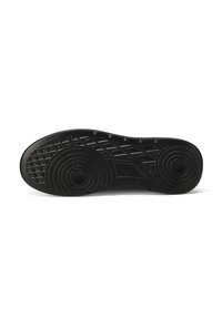 Suola di scarpa in gomma nera con motivo a grip, caratterizzata da design circolari e zigzag per una migliore aderenza, e dettagli arrotondati per una maggiore durata.