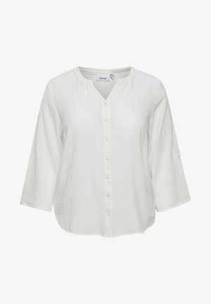 Fehér pamut ing V-nyakkal, gombos elülső résszel és háromnegyedes ujjal. Texturált anyag, laza szabással és lekerekített alsó szegéllyel.