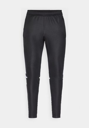 Schwarze Sporthose aus glattem Material, mit tailliertem Schnitt, elastischem Bund und weißen Akzentstreifen an den Seiten.