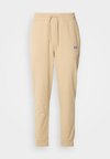 NAPIN - Pantaloni sportivi - medium beige