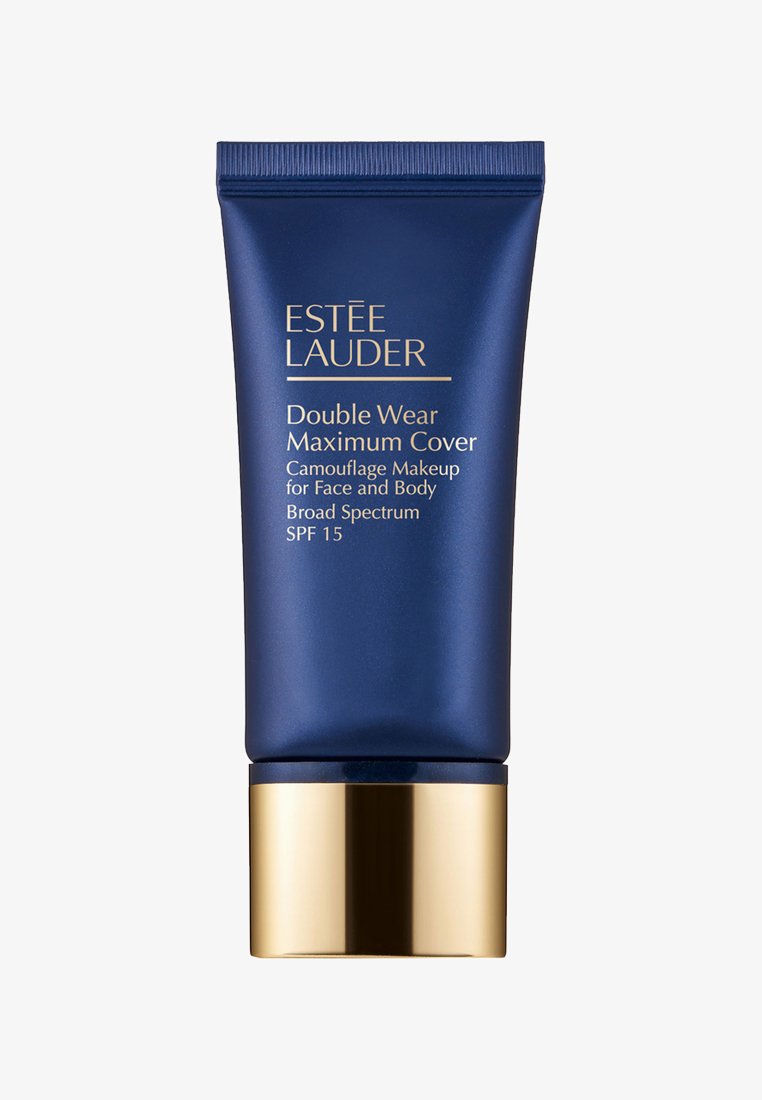 Donkerblauwe tube met een gouden basis, gelabeld "Estee Lauder Double Wear Maximum Cover," ontworpen voor gezicht en lichaam, met SPF 15 bescherming.