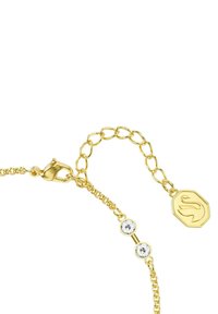 Guldkedja armband med en hummerklämma, två klara kristaller och ett hexagonalt märkesmed en stiliserad emblem.