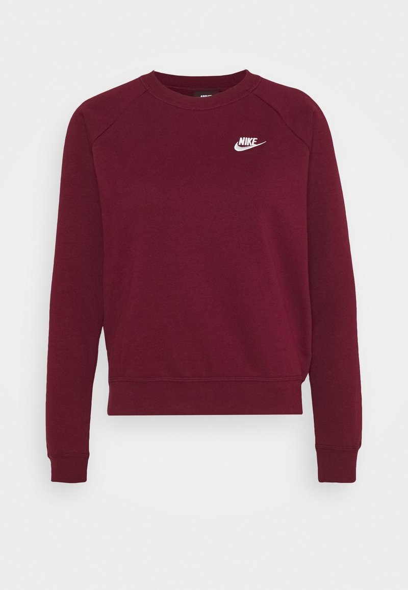 Sweatshirt bordeaux en tissu doux, avec un col rond classique, des manches raglan longues et un logo Nike blanc sur la poitrine.