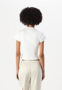 Calvin Klein Jeans VARIEGATED HALF ZIP - Jednoduché tričko - bright white