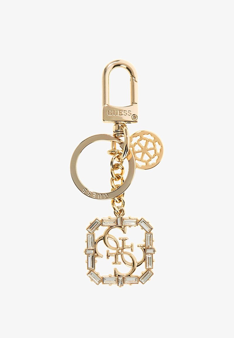 Breloczek w złotym kolorze z zapięciem, okrągłym pierścieniem i dekoracyjnym kwadratowym elementem z logo marki oraz prostokątnymi kryształowymi akcentami.