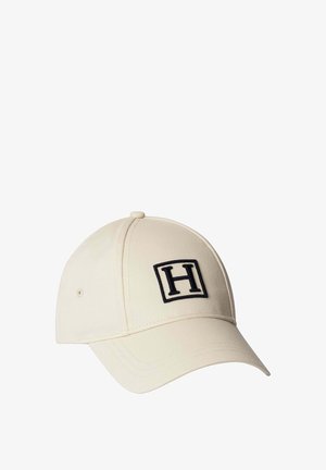 Beige baseballpet met een zwarte letter H in een vierkant op het voorpaneel.