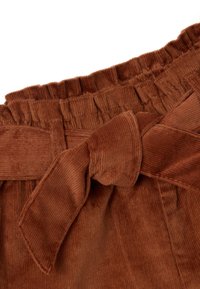 Rustkleurige corduroy broek met een gerimpelde tailleband en een gestrikt stoffen riemdetail aan de taille.